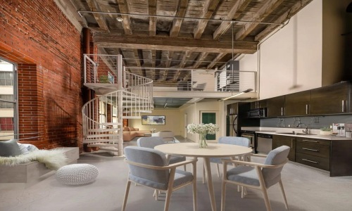 a room with a table and chairs