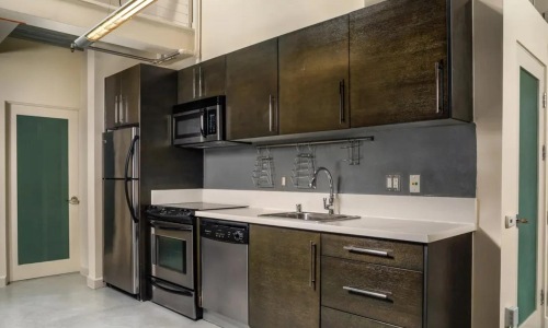 a kitchen with stainless steel appliances