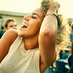 people dancing on a rooftop