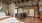 a bedroom with a wood floor