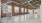 a large empty room with a staircase