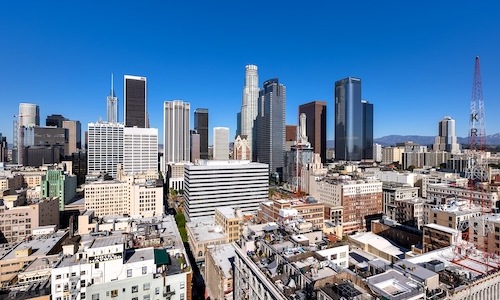 a cityscape under a blue sky