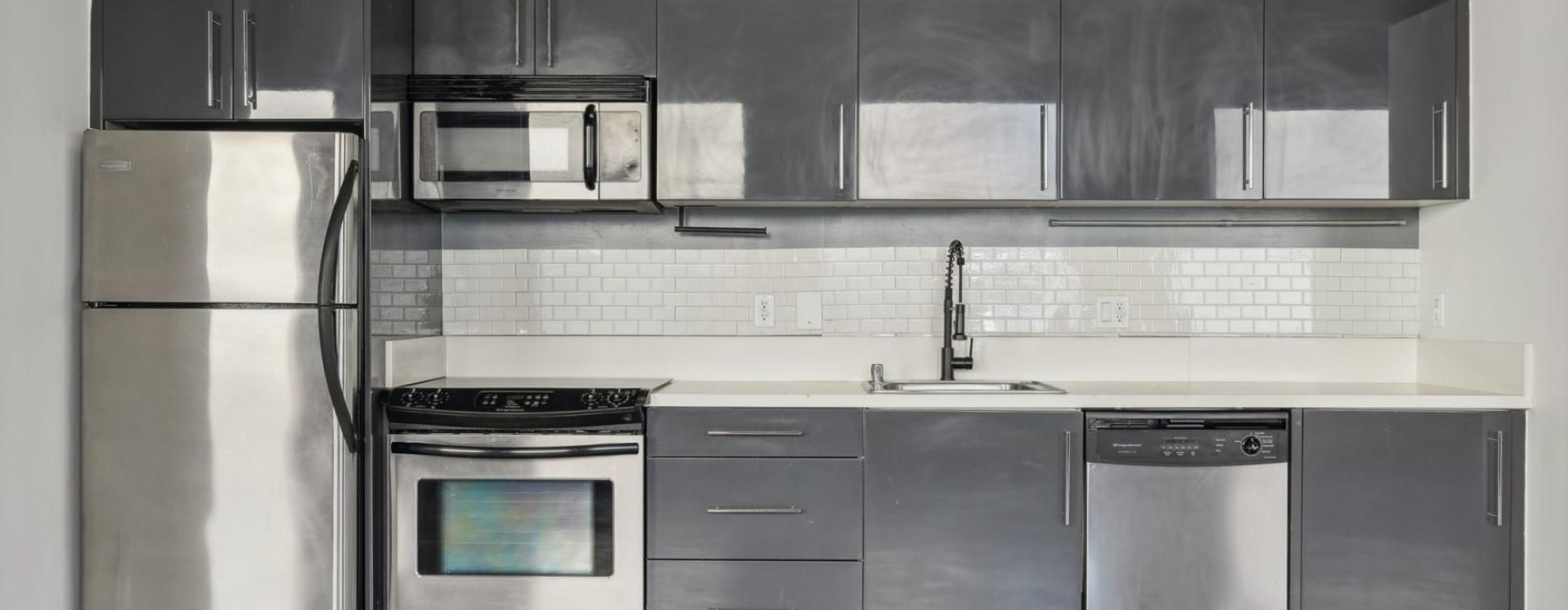 a kitchen with stainless steel appliances